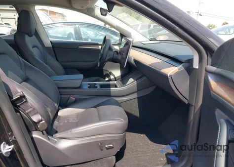 2023 Tesla Model Y Rwd z USA, uszkodzony, nr VIN 7SAYGDED8PF956018